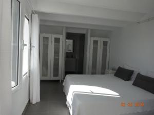 Postel nebo postele na pokoji v ubytování Casa Blanca