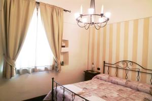 Posteľ alebo postele v izbe v ubytovaní Al Vecchio Cellaio Historical Guest House