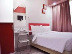 Postel nebo postele na pokoji v ubytování YY318 Hotel Bukit Bintang