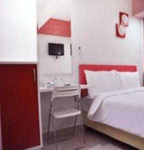 Postel nebo postele na pokoji v ubytování YY318 Hotel Bukit Bintang