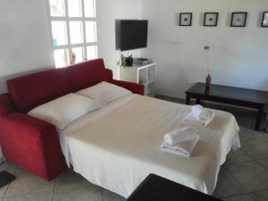 Postel nebo postele na pokoji v ubytování Trouli House