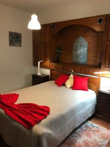 מיטה או מיטות בחדר ב-Fonte da telha Beach House