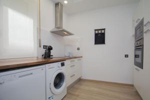 Kuchyň nebo kuchyňský kout v ubytování Apartamento Recogidas 39