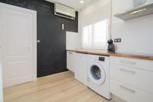 Kuchyň nebo kuchyňský kout v ubytování Apartamento Recogidas 39