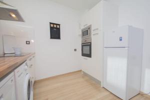 Kuchyňa alebo kuchynka v ubytovaní Apartamento Recogidas 39