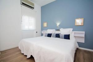Postel nebo postele na pokoji v ubytování Apartamento Recogidas 39