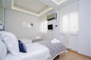 Postel nebo postele na pokoji v ubytování Apartamento Recogidas 39