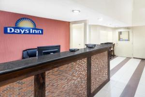 The lobby or reception area at Days Inn by Wyndham Geneva/Finger Lakes