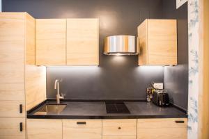 A kitchen or kitchenette at Beach & Center Premiun
