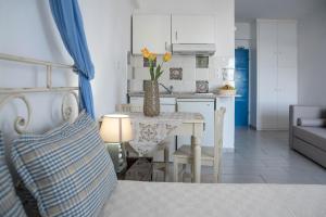 Kuchyň nebo kuchyňský kout v ubytování Maistrali Apartments