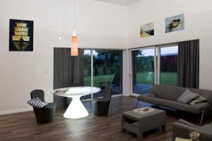 a living room with a couch and a table at Na-Horyzoncie in Ustka