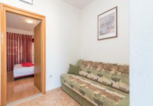 Postel nebo postele na pokoji v ubytování Apartments Ivana-Gustirna