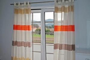 
a view through a window of a hotel room at Guest House Pereira in Vila Praia de Âncora

