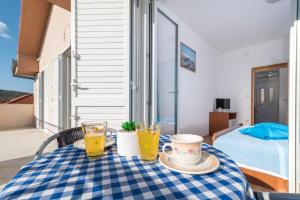 Postel nebo postele na pokoji v ubytování Apartments Ivana-Gustirna