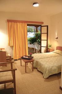 Кровать или кровати в номере Porto Merika