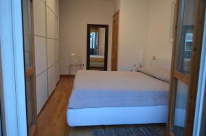 Voodi või voodid majutusasutuse La Casa di Manolo toas