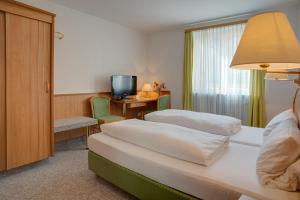 Postel nebo postele na pokoji v ubytování Hotel Möve garni