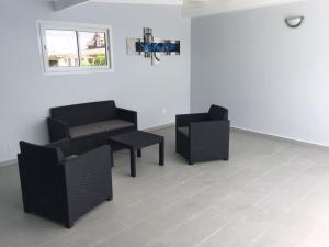 Posezení v ubytování Le Domaine Turquoise