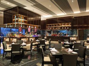 A restaurant or other place to eat at Wanda Realm Neijiang