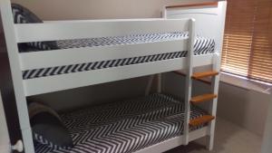 A bunk bed or bunk beds in a room at The Quiet Family Getaway