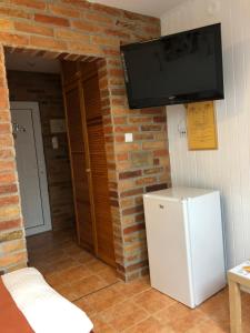 Kuchyň nebo kuchyňský kout v ubytování Autóscsárda és Panzió