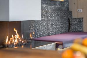 Łóżko lub łóżka w pokoju w obiekcie Alpenchalet Stadlpoint