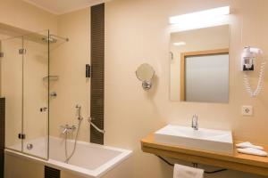 Koupelna v ubytování Hotel Bon Repos