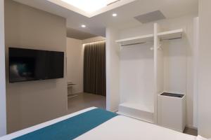 Postel nebo postele na pokoji v ubytování Airone City Hotel
