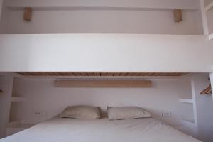 En eller flere senge i et værelse på BoardXhouse
