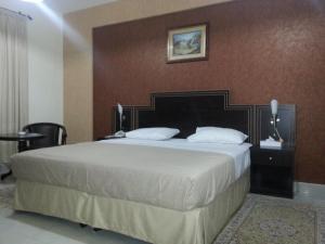 Letto o letti in una camera di Dolphin Hotel