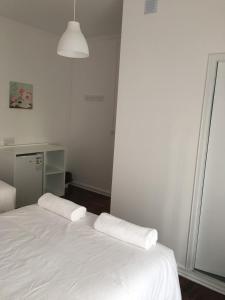 Letto o letti in una camera di Lx Center Guesthouse