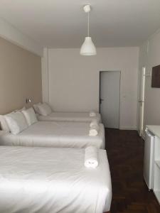 Letto o letti in una camera di Lx Center Guesthouse