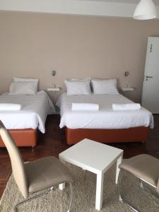 Letto o letti in una camera di Lx Center Guesthouse