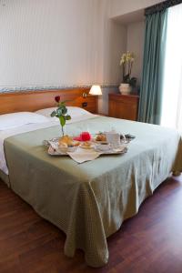 Кровать или кровати в номере Hotel Palace