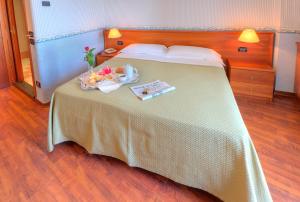 Кровать или кровати в номере Hotel Palace
