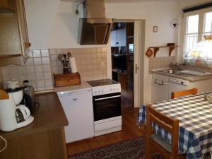 Köök või kööginurk majutusasutuses Ferienhaus Heimberger