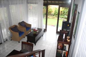 Posezení v ubytování De Puspa Residence Seminyak