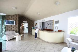 Televiisor ja/või meelelahutuskeskus majutusasutuses Hotel Splash Inn