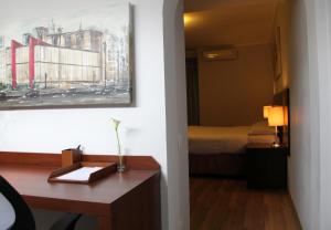 Postel nebo postele na pokoji v ubytování H3 Hotel Paulista