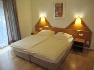 Postel nebo postele na pokoji v ubytování Hotel Fährhaus