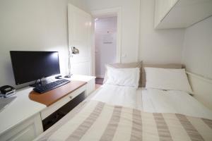 Postel nebo postele na pokoji v ubytování Vika I, As Home