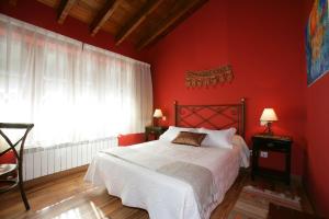 A bed or beds in a room at Bajo Los Tilos