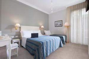 Postel nebo postele na pokoji v ubytování Ruins B&B