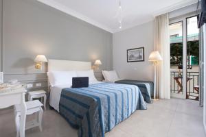 Postel nebo postele na pokoji v ubytování Ruins B&B
