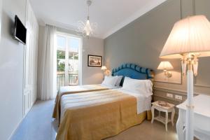 Postel nebo postele na pokoji v ubytování Ruins B&B