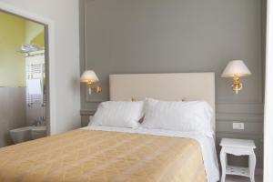 Postel nebo postele na pokoji v ubytování Ruins B&B