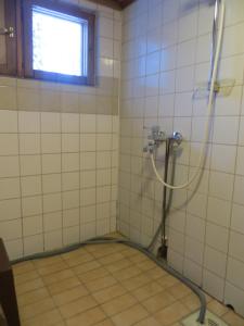 Ванна кімната в Hakamajat Cottages