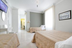 Postel nebo postele na pokoji v ubytování Ruins B&B