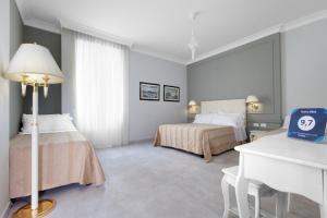 Postel nebo postele na pokoji v ubytování Ruins B&B