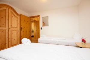 Postel nebo postele na pokoji v ubytování Akzent Hotel Alpenrose